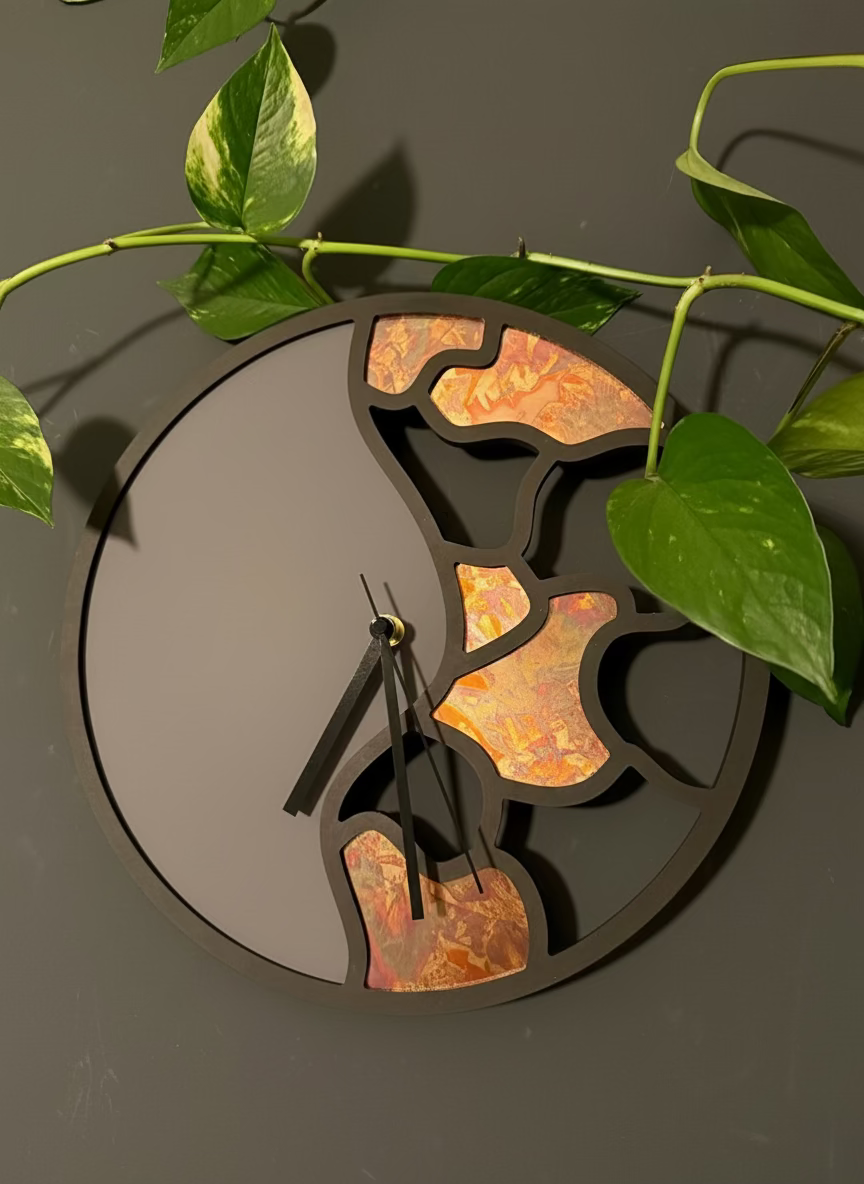 Wanduhr mit Kupfer und Fenixbeschichtung